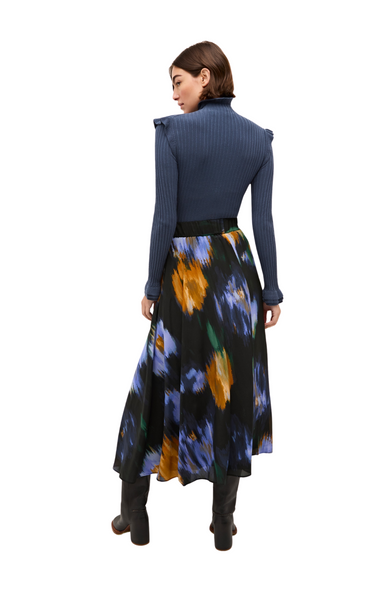 The Cambrie skirt in abstract Perigold floral is a peak Marie Oliver fall style. Saturated colors, an eye-catching pattern, and a gorgeous 100% silk fabric with a dreamy drape