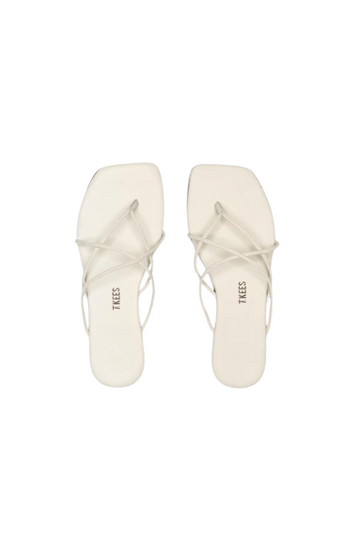 Sophistication with an edge. Clean lines, modern design - pure statement.  Elevate any outing, from casual to chic, effortlessly. Size up for half sizes. By TKEES. Square Toe Elle Sandals.