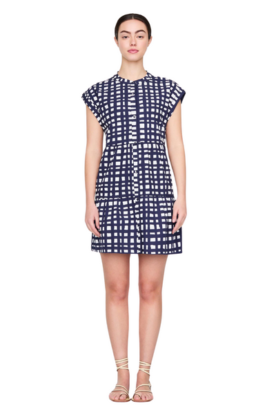 Marie Oliver blue and white navy and ivory printed Owen dress. A playful babydoll take on a classic button-front shirt dress, Owen bridges the gap between work and play. Though the tailored silhouette is perfectly appropriate for a weekday lunch meeting, it’s equally suited to a July Fourth barbecue.