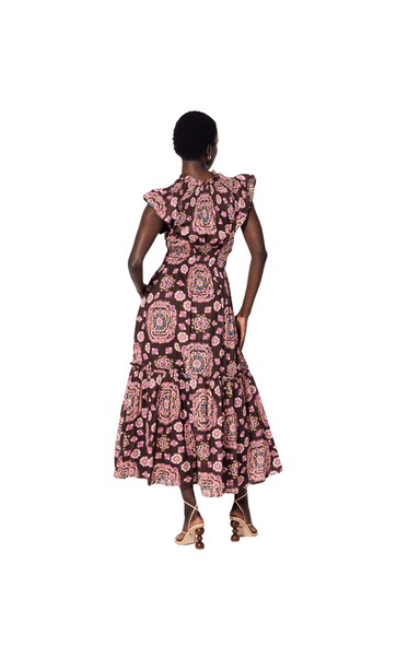 Maroon and pink printed midi dress flutter sleeve the Indira Ankle Dress by Cleobella features a highneck with a smocked detail. Rouleaux ties with tassels at the button opening add a unique and elegant touch to the dress.