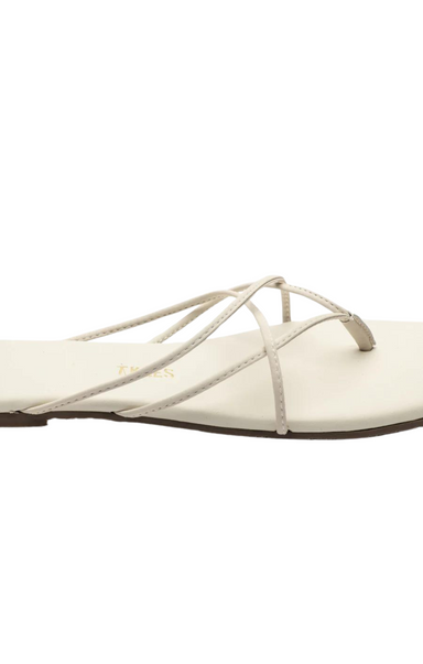 Sophistication with an edge. Clean lines, modern design - pure statement. Elevate any outing, from casual to chic, effortlessly. Size up for half sizes. By TKEES. Square Toe Elle Sandals.