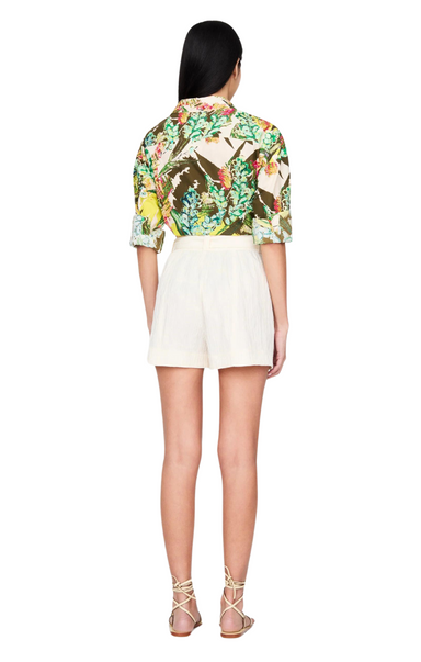 Marie oliver tropical leaf print long sleeve cotton The Nico Shirt is a classic button-up in a stylish print. The lightweight 100% cotton stunner can be worn tucked in, loose, or knotted in the front. Wear Nico with an easy short or toss it over a swimsuit for an afternoon at the pool or beach