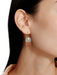 elsie earring Drop earring with a half moon aquamarine stone and sunstone fringe. By Chan Luu.