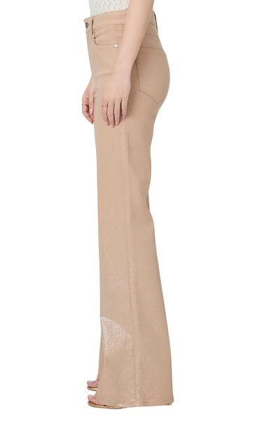 Paige denim tan leg pant glitter This super flattering, high-waisted sleek wide leg has a glittery, leather-like look, but doesn't sacrifice comfort. Cut from our coated TRANSCEND denim in a beige and silver glitter ombre luxe coating, this style is luxuriously soft with plenty of stretch and recovery to give it a fit that shines all day and night. Leenah