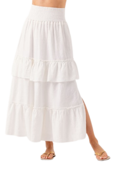 Meet the Yara skirt. Made in washed lux linen fabric, Yara has feminine flowing tiers that cascade from a cinched elastic waist, creating the perfect shape from your waist through your body. This skirt is sure to turn heads wherever you go. Each tier is trimmed with feminine ruffles, and a side slit makes Yara perfectly flirty. Sundays White Yara Skirt.